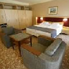 Gemütliches Doppelzimmer mit französichem Bett im Hotel Drava 4*